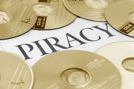 cd and word of piracy, concept of illegal copyの写真素材