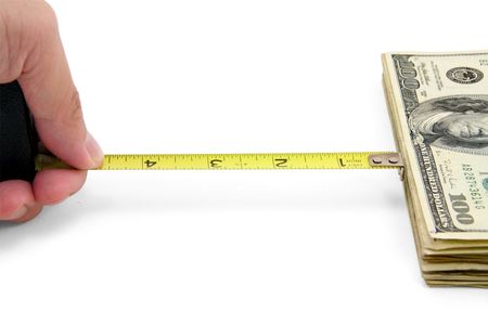 yellow measuring tape and us dollars, concept of how close to success in business.の写真素材