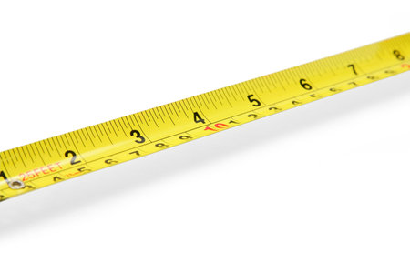 yellow measuring tape isolated with a white background.