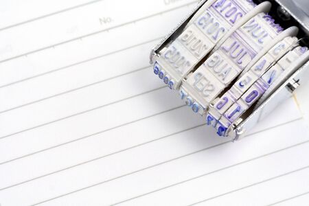 Date Stamp Close Up with blank paperの写真素材