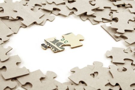 us dollar and puzzle, business conceptの写真素材