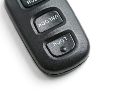 car key and remote control with white backgroundの写真素材