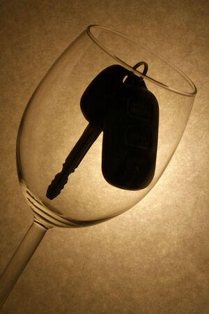 car key in a wine glass,concept of drunk driverの写真素材