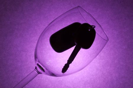 car key in a wine glass,concept of drunk driverの写真素材