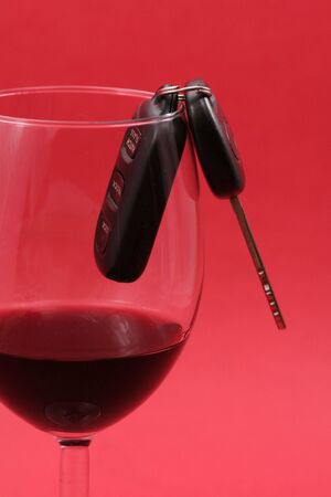 car key in a wine glass,concept of drunk driverの写真素材
