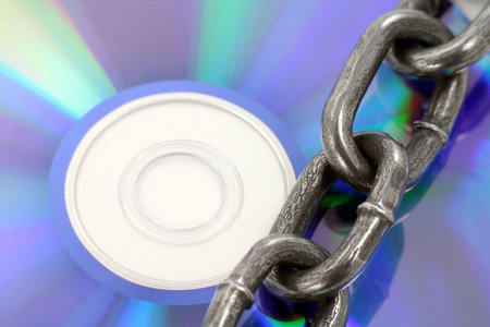 chain and cd,concept of copyrightの写真素材