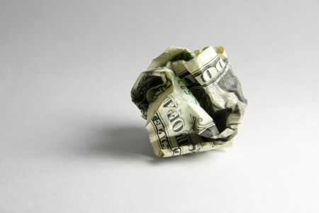 crumpled usa dollar ball, business conceptの写真素材