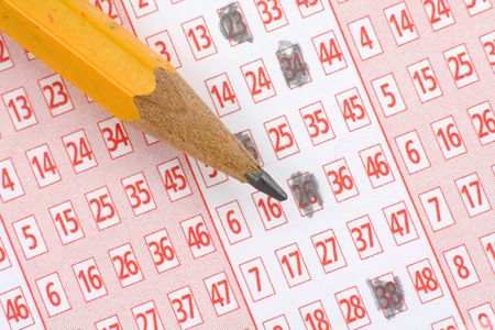 Lottery Ticket and pencil  close up shotの写真素材