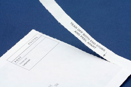 opening a peel apart mail, business concept