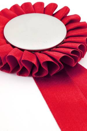 red award ribbons badge with white backgroundの写真素材