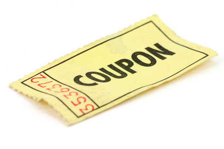 A yellow ticket on white backgroundの写真素材