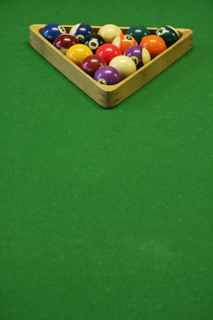pool balls on green pool table