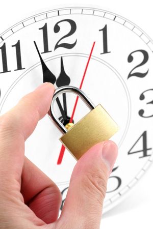 lock and clock with white background, concept of time controlの写真素材