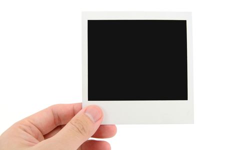 hand holding photo with white backgroundの写真素材