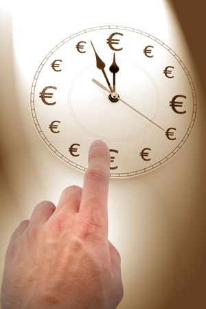clock and Euro Symbol, concept of time is moneyの写真素材