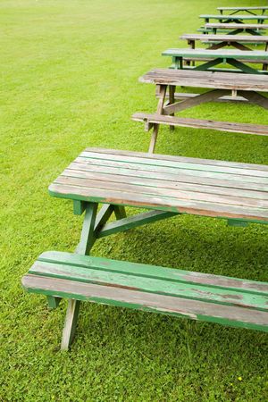 bench and green lawn at a parkの写真素材