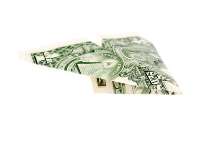 dollar paper airplane, business concept