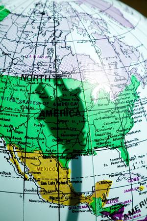 map and the shadow of Electric Plug, concept of Power Supply shortageの写真素材