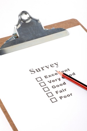 a Clipboard and questionnaire with white backgroundの写真素材