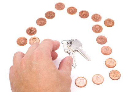 coins and home keys, concept of Real Estate finance