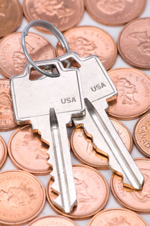 coins and home keys, concept of Real Estate finance