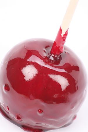 Red Taffy Apple with white backgroundの写真素材