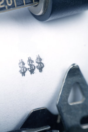 Typewriter close up shot, concept of making moneyの写真素材