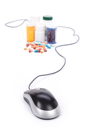  Medicine and computer mouse, concept of online pharmacyの写真素材