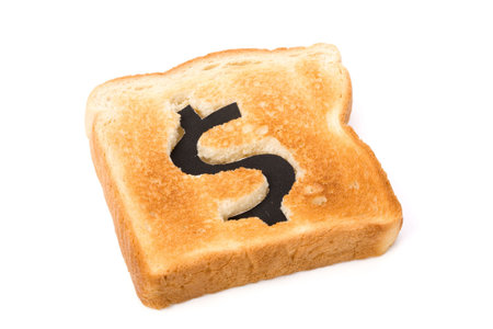 bread slice with dollar sign, concept high price of food or food for businessの写真素材