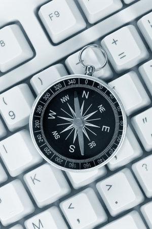 Computer Keyboard and Compass, internet conceptの写真素材