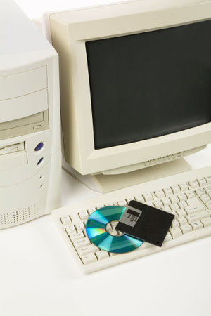 Desktop Computer and CD-ROM, floppy Disk close up shot