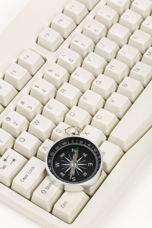 Computer Keyboard and Compass, internet conceptの写真素材