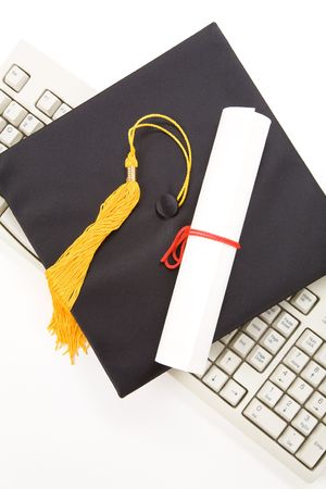 Black Mortarboard and computer keyboard, online learningの写真素材