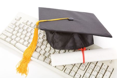 Black Mortarboard and computer keyboard, online learningの写真素材