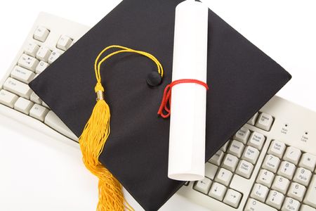 Black Mortarboard and computer keyboard, online learningの写真素材
