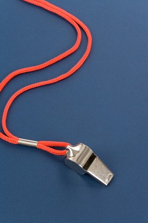 a whistle with blue backgroundの写真素材