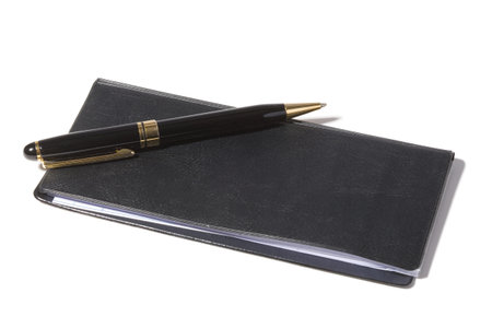 Checkbook and pen with white backgroundの写真素材