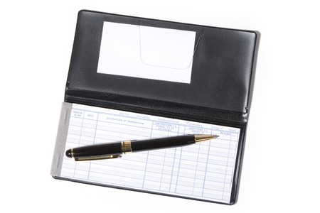 Checkbook and pen with white backgroundの写真素材