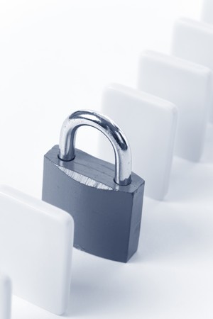 Domino and Lock, Concept of business damage control  の写真素材