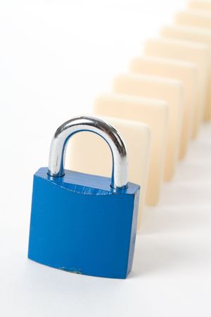 Domino and Lock, Concept of business damage control  の写真素材