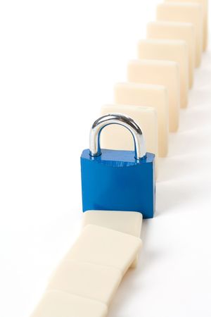 Domino and Lock, Concept of business damage control  の写真素材