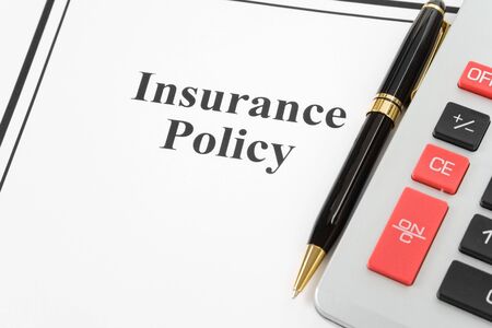 Document of Insurance Policy and calculator,  for background  の写真素材