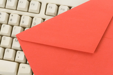 Envelope and computer keyboard, concept of emailの写真素材