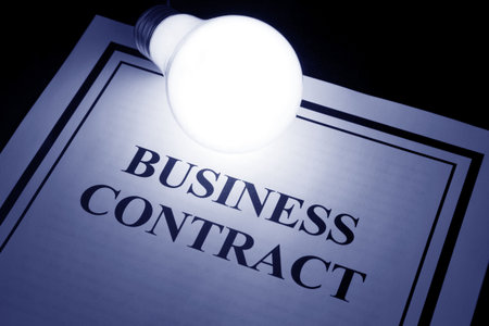 Business Contract and light bulb, concept of smart in businessの写真素材