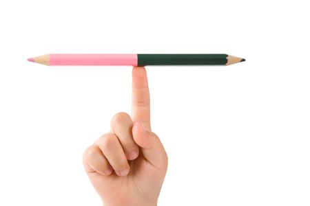 Two color pencil and hand, Concept of balanceの写真素材
