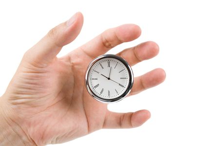 Clock face and finger, concept of Time Control and Balanceの写真素材