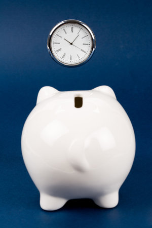Piggy Bank and clock, Business concept