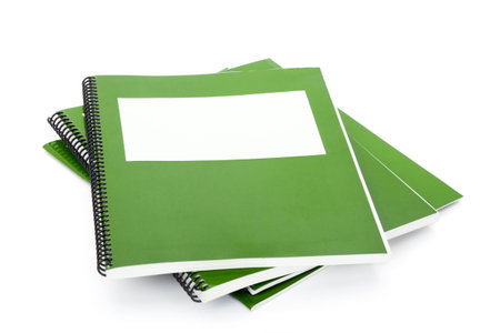 Green school textbook, notebook or manual with white background