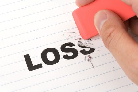 eraser and word loss, concept of Reduce financial lossの写真素材
