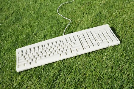 Computer Keyboard and lawn, concept of Freedom, Environment Protectionの写真素材